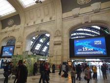 Large digital billboards, examples of DOOH media in a train station
